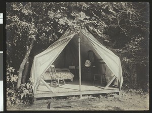 Tent with a bed and desk inside, Sonoma County