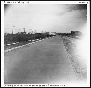 Eastward view of Twentieth Street from Redondo Boulevard showing road work, 1927