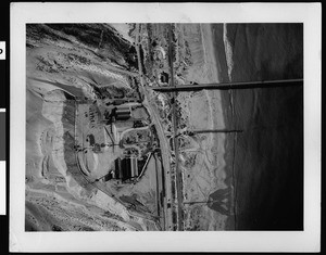 Aerial view of flooded(?) area near ocean, January 1938