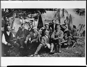 Members of the Sunset Club sitting outside of tents at Mountain View Camp owned by Henry O'Melveny, ca.1915