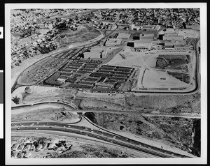 Aerial view of California State University at Los Angeles, showing a freeway at bottom