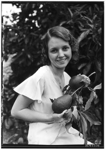 Miss Margaret Thornton with Calavo avocados, May 1932