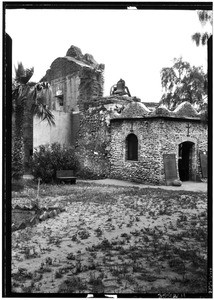 Exterior view of the San Diego Mission, showing structural damage, July, 1926