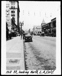 Automobiles parked on Hill Street, north from Seventh Street, Los Angeles, ca.1920