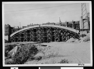 View of the construction of a large arch on the Fourth Street Viaduct