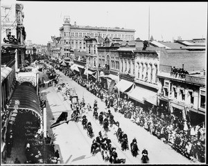 View of Spring Street looking north from First Street during the La Fiesta Parade, Los Angeles, ca.1903