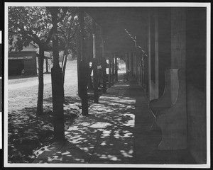 Porch of the old John Thompson Hotel, Coulterville, ca.1930