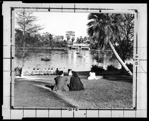 View of MacArthur Park showing the Westlake Theatre in the background, ca.1950