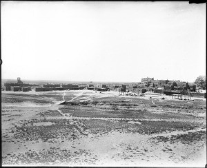 View of a pueblo in Taos, "showing the old church", New Mexico, ca.1895