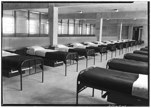 Cots inside of a room at the Federal Prison at Los Angeles Harbor, June 1938