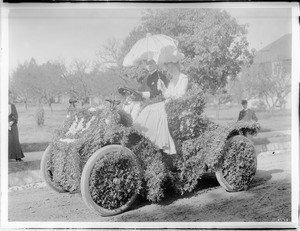 Flower-bedecked automobile for a parade, ca.1903