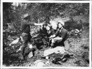 Men playing cards and drinking and one shoots another, ca.1930