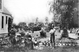 Portrait of a family at their home on the southwest corner of Wilcox Avenue and Hollywood Boulevard, Los Angeles, ca.1896