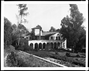 Exterior view of Orr Hall at Occidental College, showing trees and vegetation