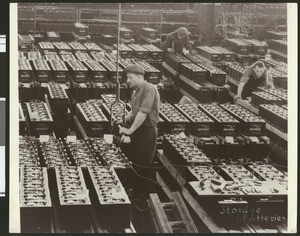 Workers and storage batteries, ca.1930