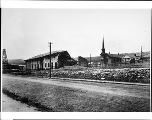 Exterior view of Adobe Jimeno and the ruins of the Convent of Santa Catalina in Monterey, ca.1900