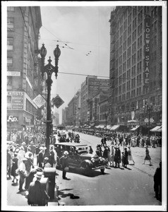 View of the corner of West Broadway and South Seventh Street in Los Angeles, ca.1926