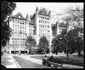 Exterior view of the Philharmonic Auditorium, located at Fifth Street and Olive Street, showing Pershing Square in the foreground, 1905