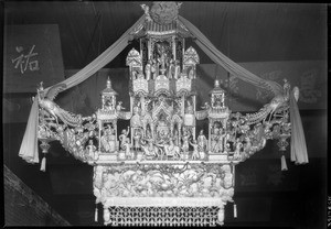 Small statue inside the Kong Chew Chinese Temple in Los Angeles' Chinatown, November 1933