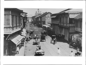 Looking north northwest down Rosario Street in Manila, Philippines, ca.1900