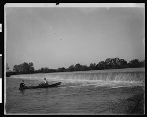 Kings River Dam with people in rowboat, ca.1904
