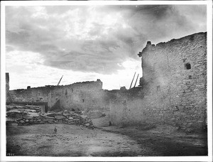 Adobe dwellings in the village of Shonguapavi at sunset, ca.1900