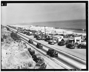 Beach camping area near a highway