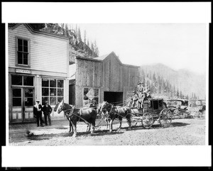 People on stage coach in front of post office in Red Mountain, Colorado, 1890