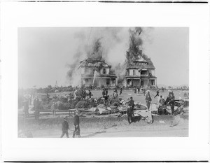 Belmont Hotel on fire at the corner of Belmont Street and First Street, Los Angeles, December 16, 1887