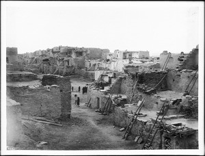 Low oblique view from above the Hopi village of Oraibi, showing terraced houses, Arizona, 1898