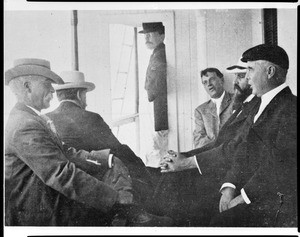 Five Sunset Club members aboard a boat, ca.1900