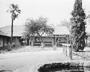 Exterior view of the Palomares adobe after its restoration, ca.1940