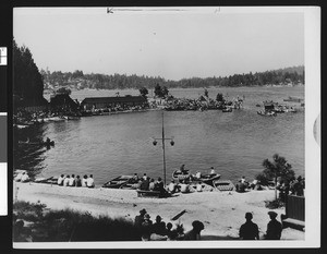 People gathered on the shore of Lake Arrowhead, ca.1950