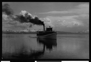 Steamboat on Lake Tahoe, looking west from Tahoe Tavern with Boundary Pass at left, ca.1910