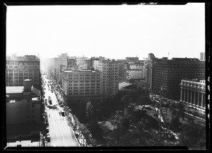 View of Pershing Square from the Pershing Square Building, showing a street on the left, 1930