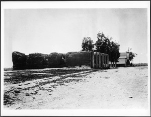 Exterior view of the ruins of an adobe customs house in Tijuana, Mexico, ca.1900