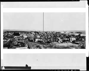 Panorama of Venice, California, showing roller coasters on the pier at right, 1924