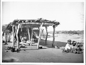 Two Pima Indian woman, Si-Rup and Vaugh Kums' wife, making "Ollas", Pima, Arizona, 1904