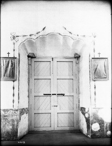 Door from inside church to outside court of Mission San Luis Rey de Francia, California, ca.1908