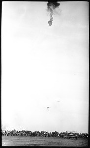 Double parachute drop from a balloon at the Dominguez Hills Air Meet, 1912