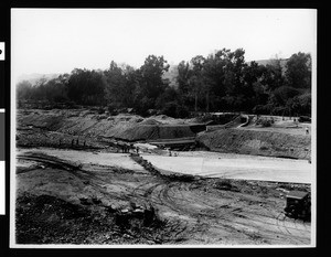 Men surveying flood damage in Los Angeles, 1938