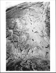 A group of climbers scaling the rock face Half Dome in Yosemite Valley (Yosemite National Park), 1930