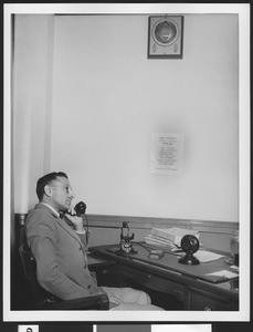 Male employee with a telephone at the Haas Building Electrified Office, ca.1930