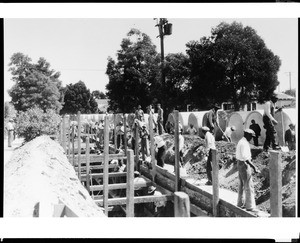 View of Fifth Avenue, looking north from Fifty-Fourth Street, showing construction of the Slauson Avenue storm drain, June 1934