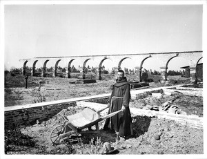 Neophyte at work on reconstruction of Mission San Luis Rey de Francia, California, 1904