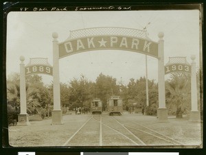 Oak Park in Sacramento, showing trolley cars, ca.1900