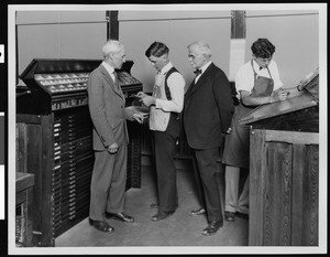 Portrait of men supervising typography students at Frank Wiggins Trade Tech, 1920-1929