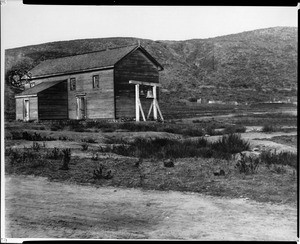 Exterior view of San Diego's Old Town Mission church and church bells, ca.1898