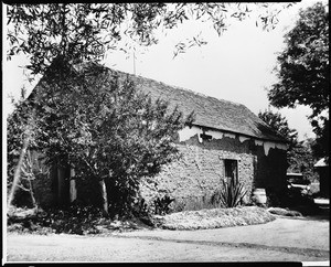 Exterior view of the Miguel Parra adobe stripped of all its spackle, east of San Juan Capistrano