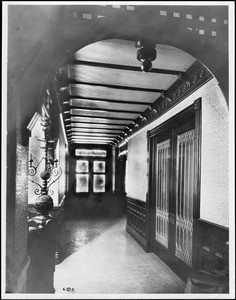 Interior view showing the front hall and door of the Winchester "Mystery" House, Santa Clara, California, 1923